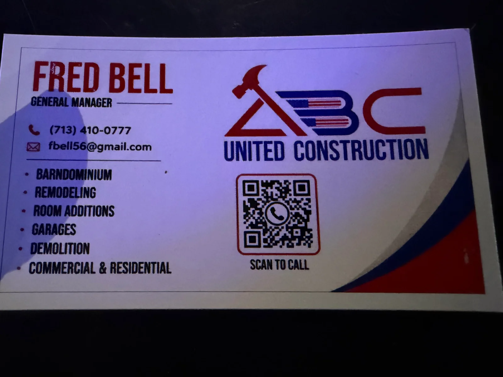 Construction business card with logo, contact details, and QR code for ABC United Construction